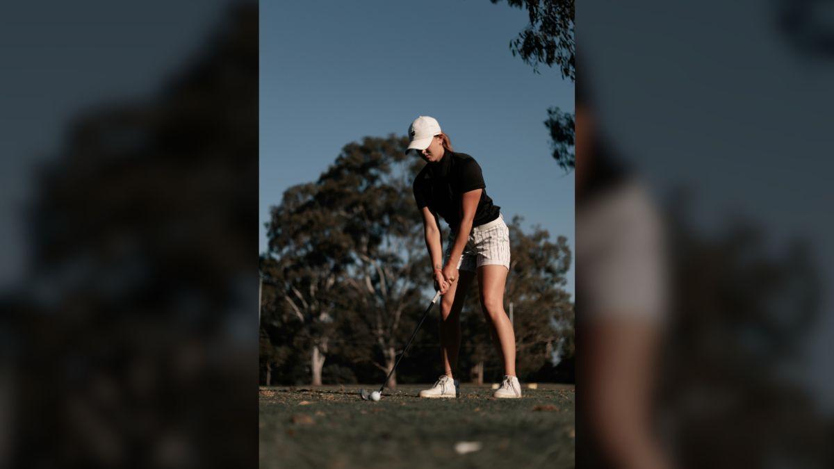 Photo of a female golfer.