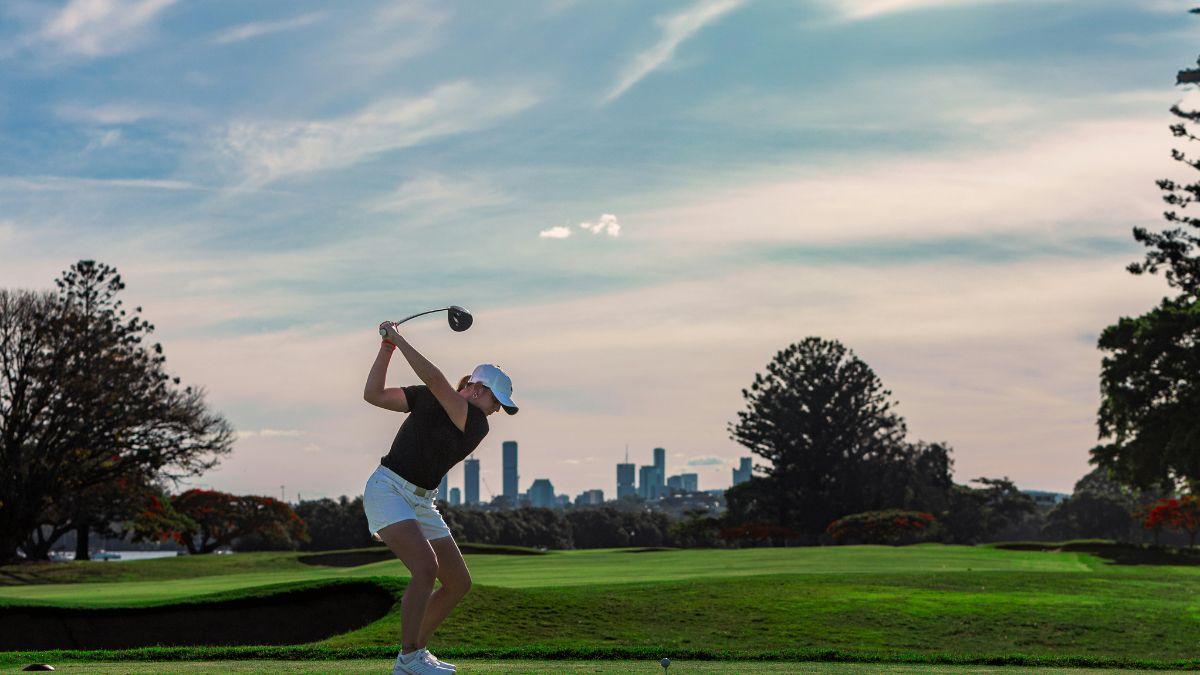 Image of a woman playing golf.