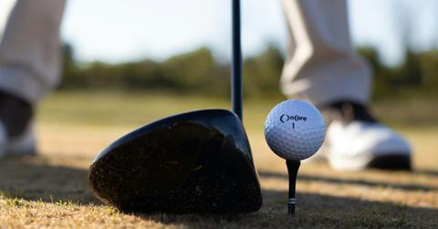 Image of a golf ball and a clubhead.