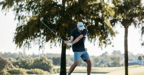 Image of a man playing golf.