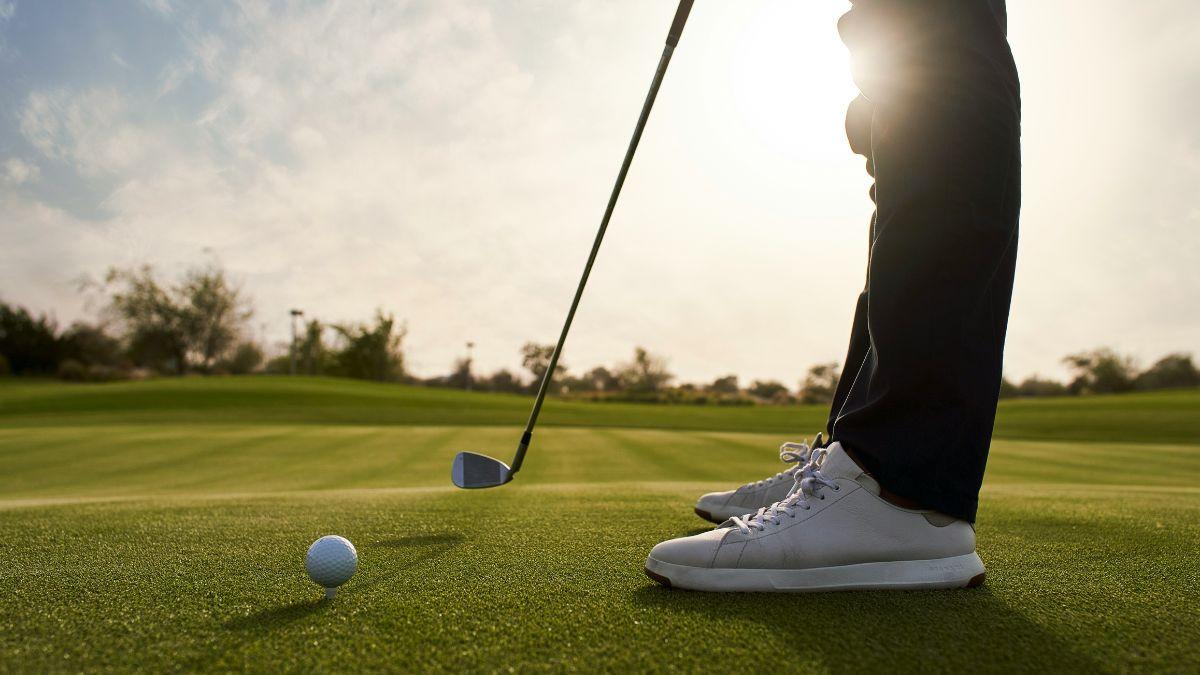 Image of a man playing golf.